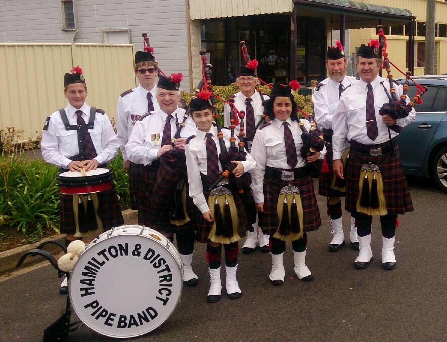 Members of the Hamilton Pipe Band.