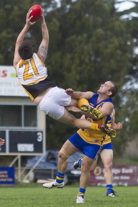 Hawkesdale/Macarthur's Lachie Reichman takes a high flying mark during the Mininera s interleague clash with Gold Rivers Football League at Lake Bolac. The MDFL went down to its rival by 33 points.  
 Picture: PETER PICKERING