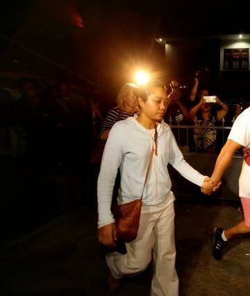 Michael Chan and Febyanti Herewila leave Kerobokan Prison after being refused a final visit before the transfer. Photo: Kate Geraghty