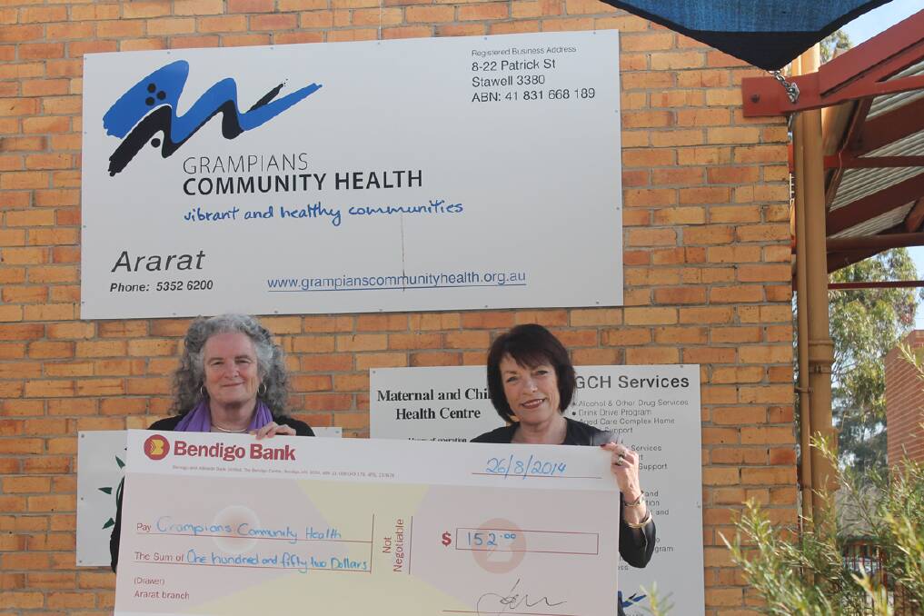 Jill Miller, CEO Grampians Community Health, receiving a cheque from Therese Roper, branch manager of Bendigo Bank Ararat.