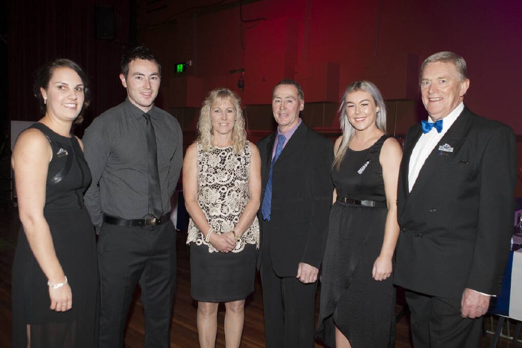 Victoria Police Blue Ribbon Foundation Ararat branch member Jess Baird (left) and president Terry Weeks (right) with members of the Bond family, Brad, Lindy, Michael and Danielle.  
 Pictures: PETER PICKERING