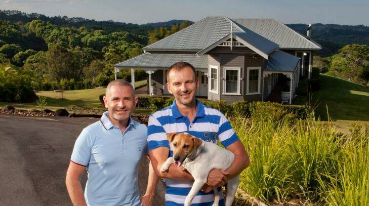 Gavin Atkins and Warren Sonin with their dog Charlie. Photo: Paul Harris
