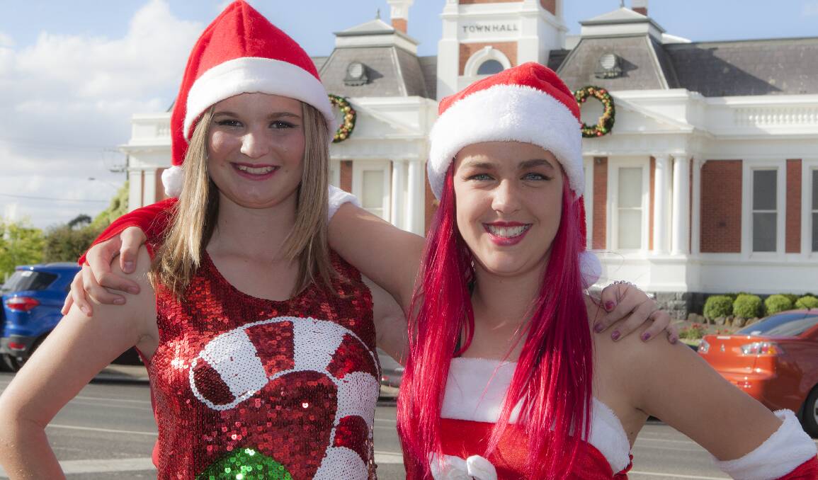 FESTIVE: Aleysha Hall and Keana Thomas in the spirit at last year's Christmas late night shopping event in Ararat. Pictures: PETER PICKERING.
