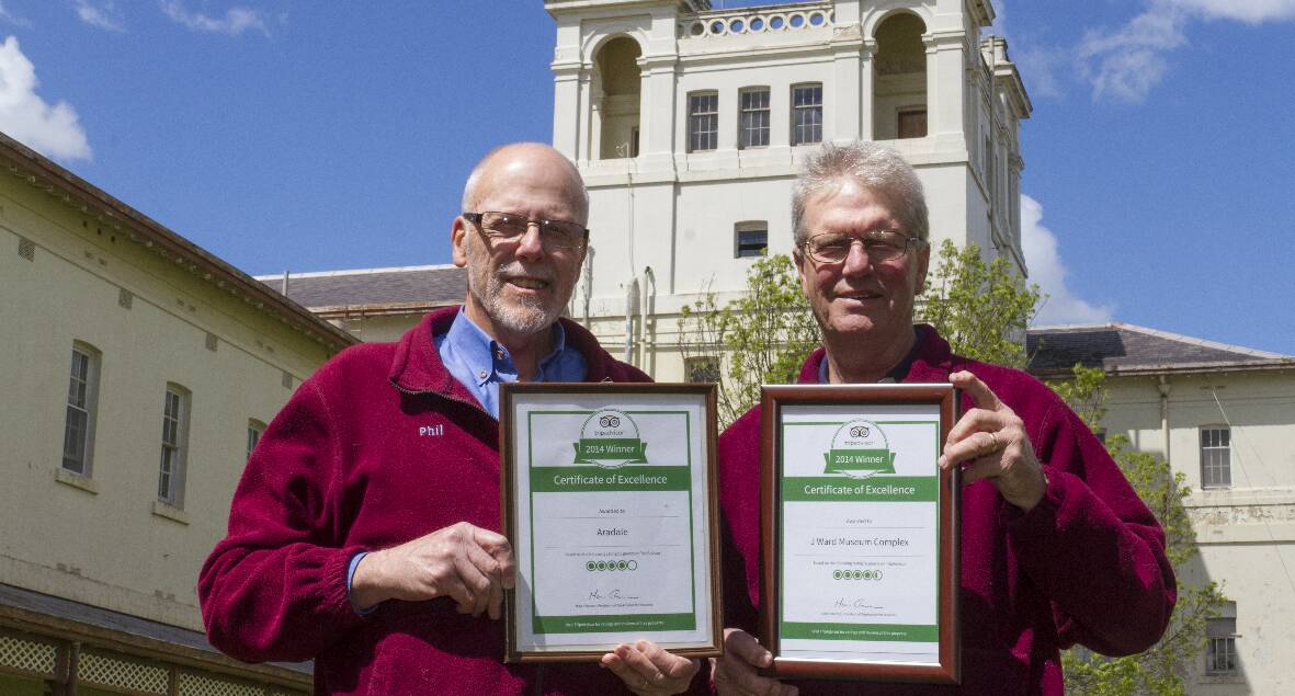 Phil Davies and Alex Beveridge at Aradale with the Tripadvisor awards. Picture: PETER PICKERING