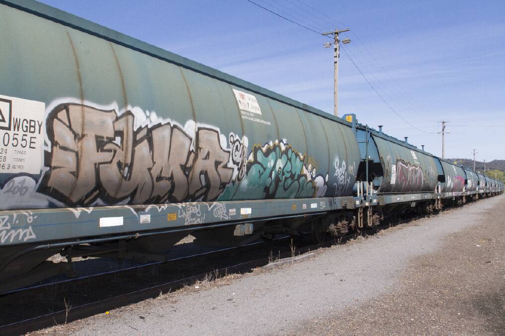 Ararat police have arrested four people they allege were in the middle of an act of graffiti at the Ararat rail yard. Picture: PETER PICKERING.