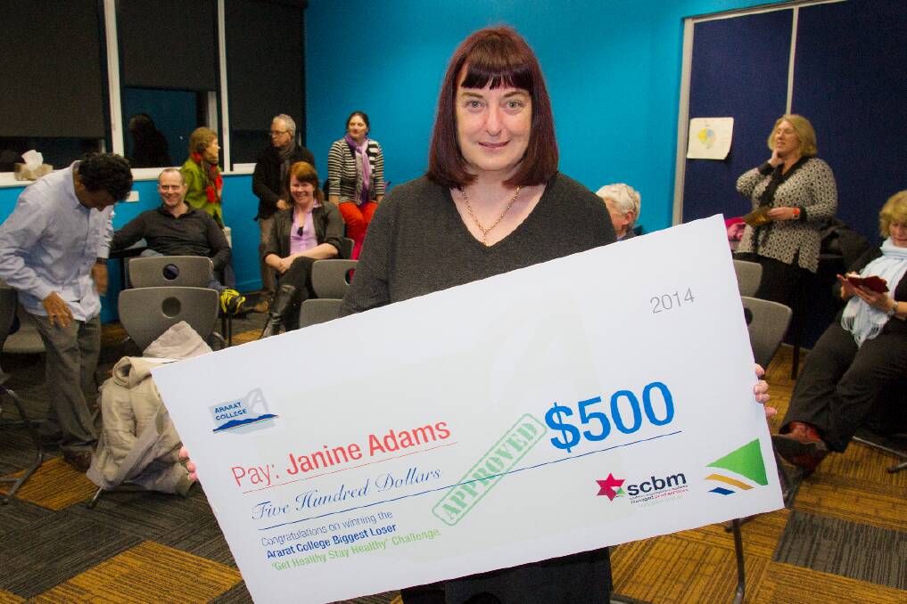 Ararat College Biggest Loser winner Janine Adams with her cheque prize. Picture: PETER PICKERING