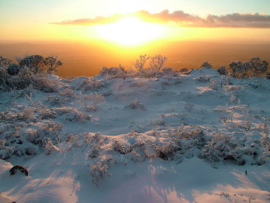 Sunrise on Mt William in the Grampians last Saturday, showing a thick cover of snow. Picture: AIDEN BANFIELD