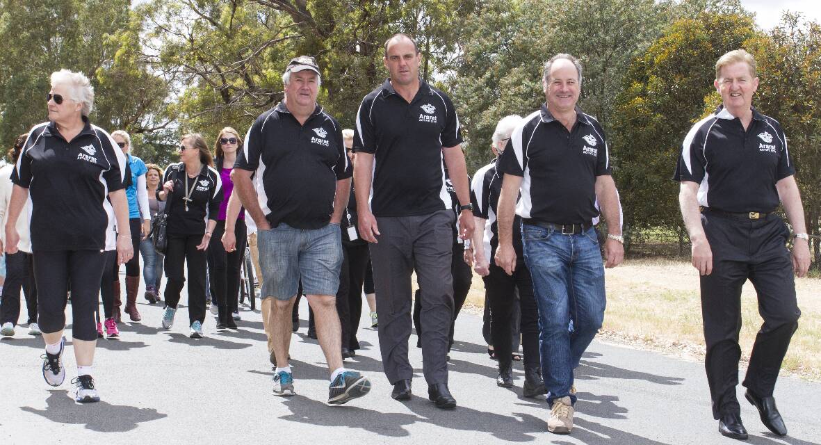 (l-r) Deb Slorach, Gary Pianta, Nationals candidate for Ripon Scott Turner and Ararat Rural City Mayor, Cr Paul Hooper take Deputy Premier Peter Ryan on a leisurely stroll from Richardson Oval to Chalambar Golf Club. Picture: PETER PICKERING