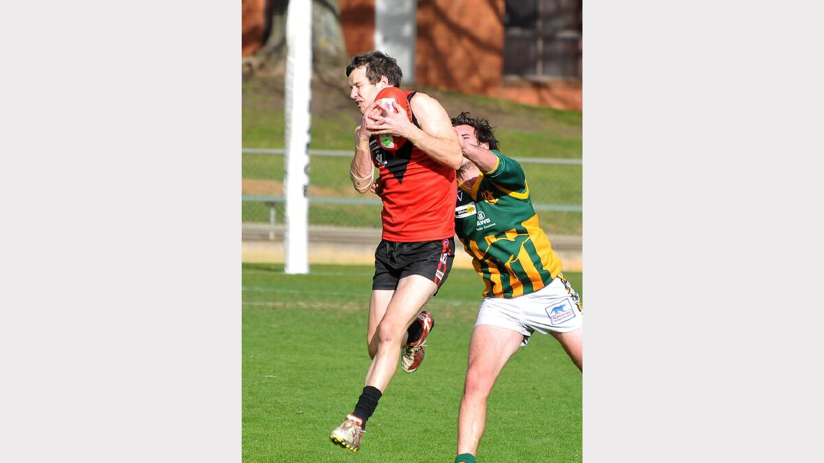 Stawell Warriors forward Brenton Potter takes a strong chest mark in front of his Dimboola opponent in Saturday's loss.