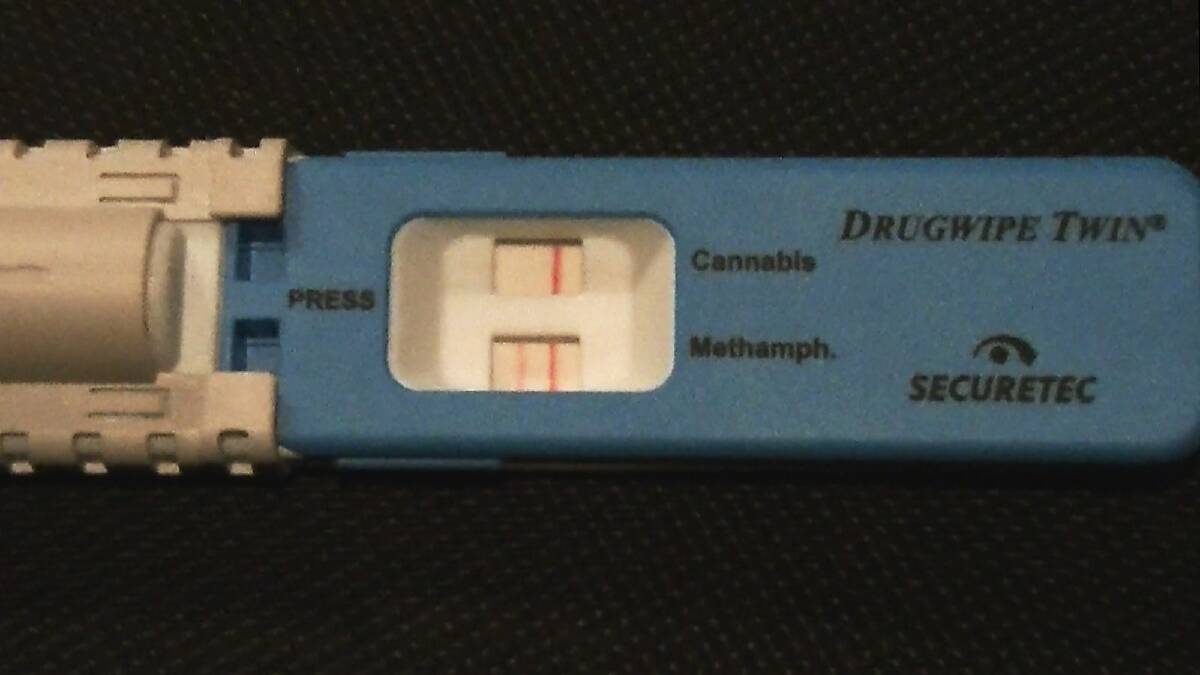 A road-side drug test showing a positive reading for methamphetamine.