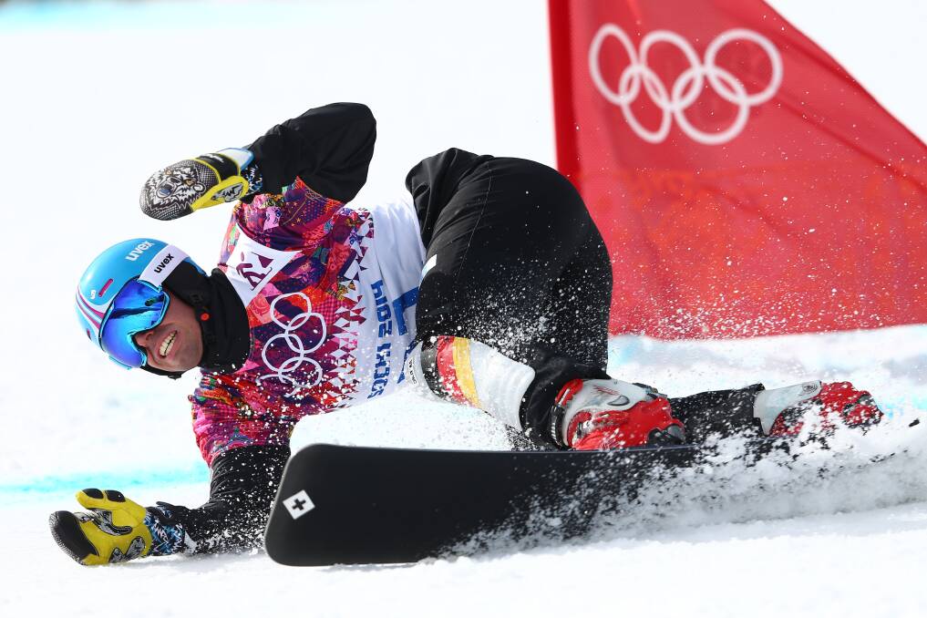 Patrick Bussler of Germany competes in the Snowboard Men's Parallel Giant Slalom 1/8 finals on day twelve of the 2014 Winter Olympics at Rosa Khutor Extreme Park on February 19, 2014 in Sochi, Russia. Photo: GETTY IMAGES