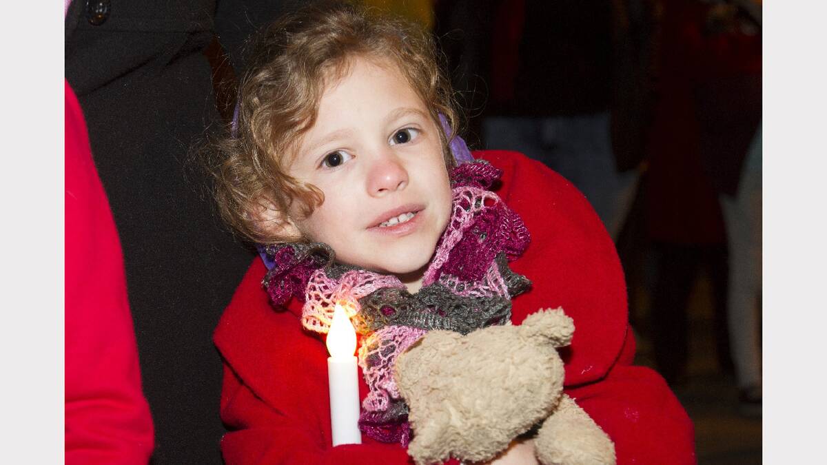 Lucinda had her candle and teddy bear for the Dawn Service.