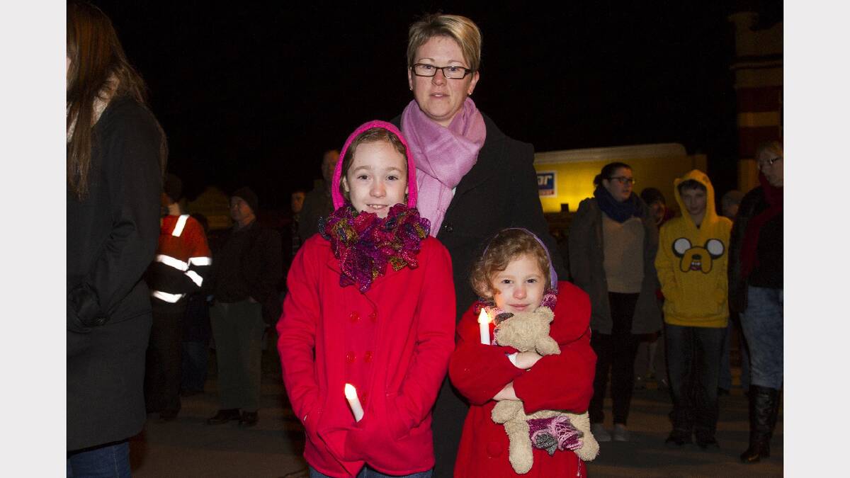 Rugged up for the Dawn Service were Brianne Grayling with Jacqueline and Lucinda.