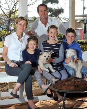 Geoff and Kim Hunt with their children Phoebe (left), Mia and Fletcher Photo: Les Smith