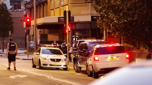 Police block off Charles Street in Parramatta where two people have been shot dead. Photo: James Brickwood