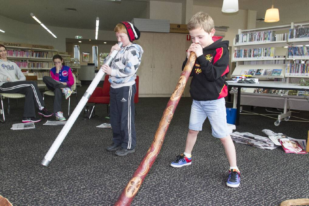Tyson and Ashton do a duet on the didgeridoo during Naidoc Week activities at the Ararat Library.