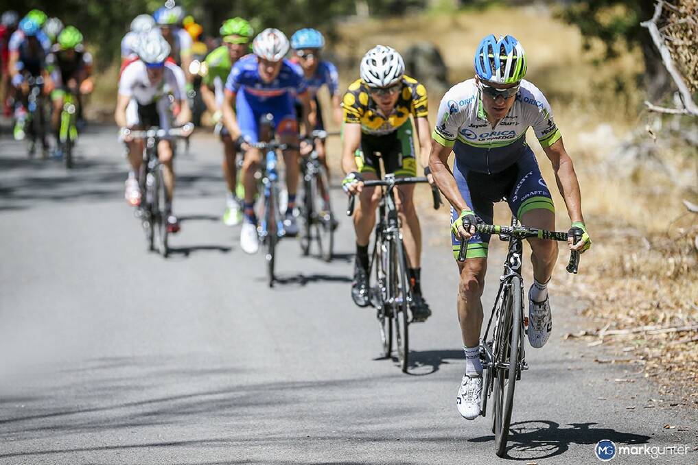 Eventual Jayco-Herald Sun Tour winner Simon Clarke makes his race-winning move on Mount Alexander during stage two. Thomas Hamilton, in the polka dot jersey of the KOTM classification leader, was the first to respond. Pictures: MARK GUNTER AND MATT DE NEEF