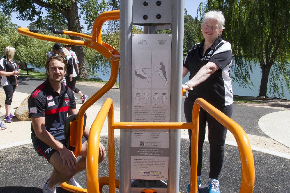 Ararat Rural City councillor Fay Hull joins Essendon captain Jobe Watson during the lunchtime exercise session.