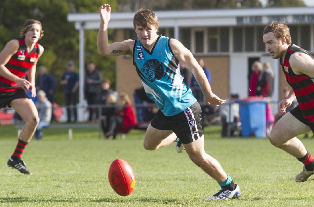 Moyston/Willaura sits a game clear atop the Mininera and District Football League ladder courtesy of a 123-point thrashing of Penshurst on Saturday. Aidan Bell (pictured above) kicked an equal game high six goals to be named best afield for the Pumas in the percentage boosting win. Picture: PETER PICKERING