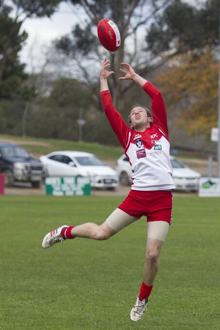 Will Bell juggles a mark during the Ararat Rats’ loss to Horsham Saints, which saw the team go down by 35 points and slip to fourth on the Wimmera League ladder. Picture: PETER PICKERING