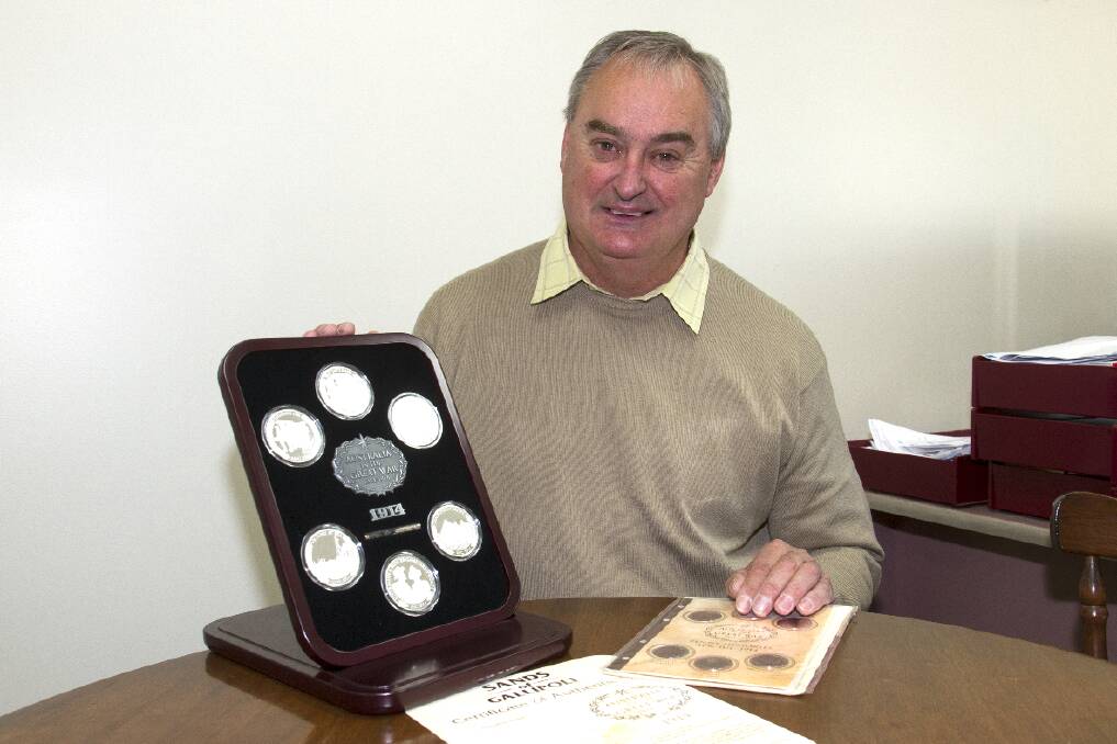 Greg Paterson and his set of limited edition medallions won in the Sands of Gallipoli competition.