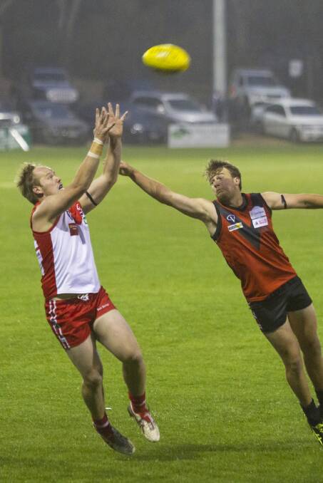 Ararat assistant coach David Brady puts himself in a good position to take the mark.