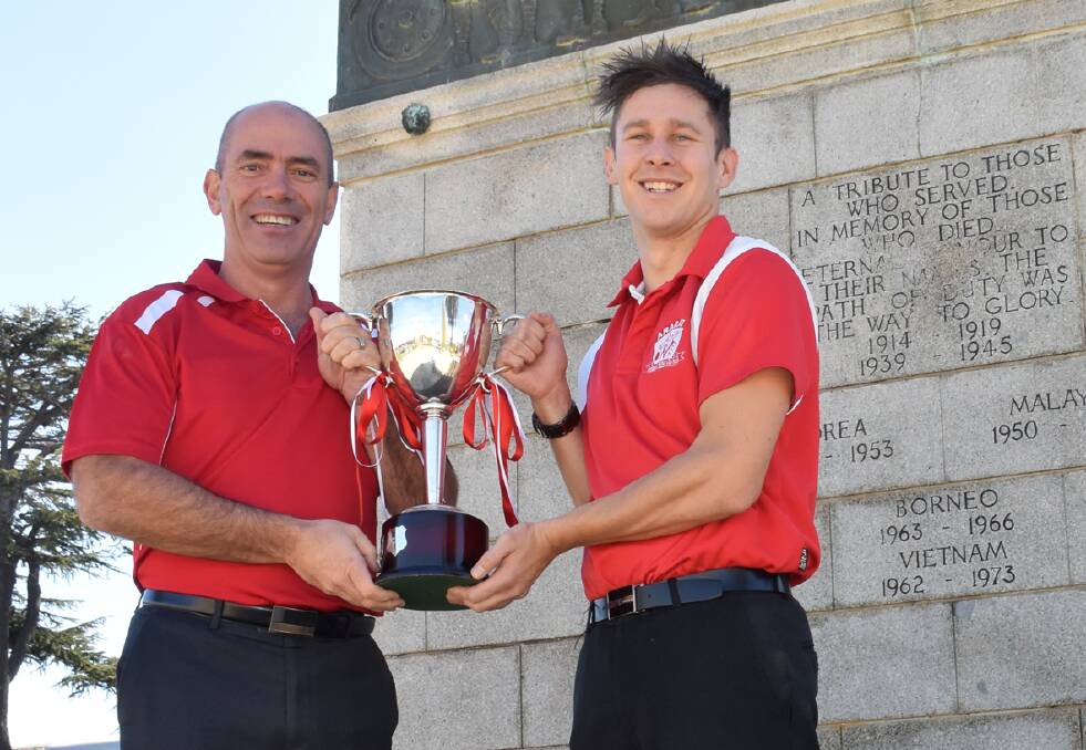 Ararat coach David Hosking and captain Alan Batchelor visited the Ararat War Memorial this week ahead of tomorrow night’s Anzac clash against Stawell, which will see the Rats battle to retain the Perce Bushby Cup. Picture: SAM SHALDERS