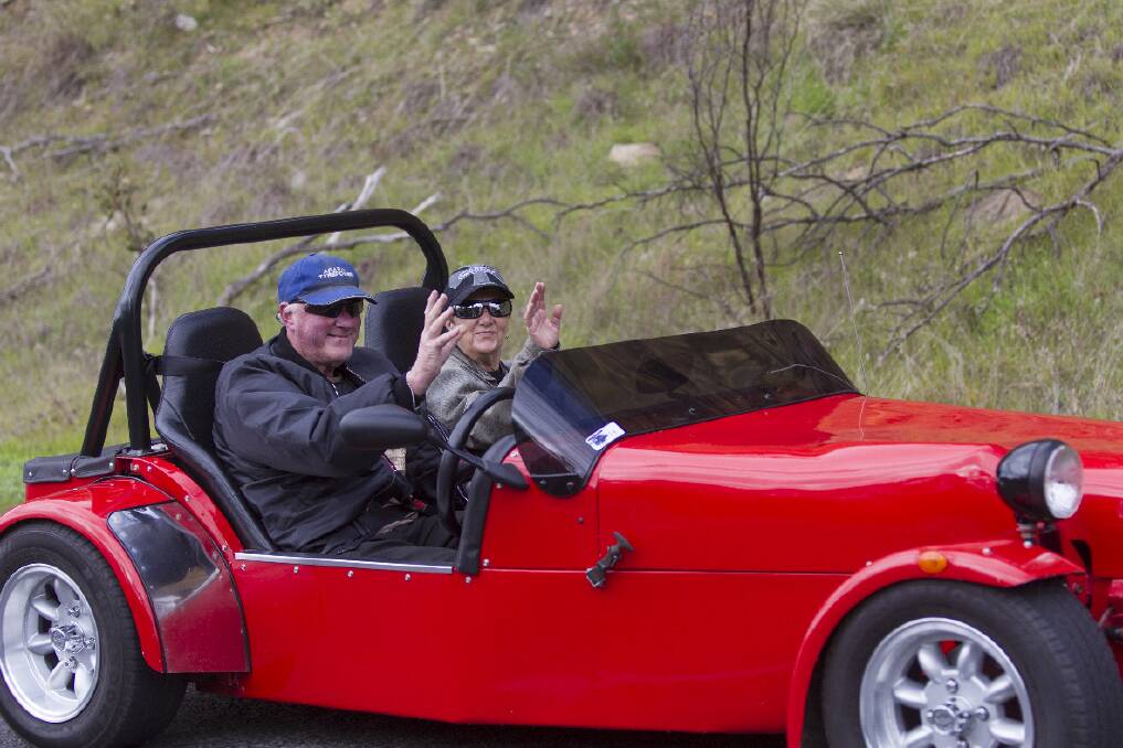 Russell and Helen Ferguson in their tourer during last year’s ‘cruise’.