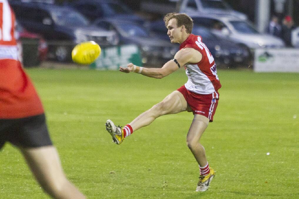 Jake Robinson kicks one of his four goals at Alexandra Oval during Saturday night’s match against Stawell. Pictures: PETER PICKERING 