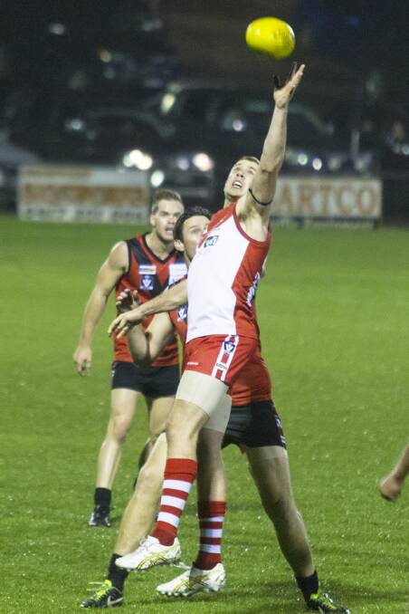 Ararat ruckman Justin Summons wins the tap during a stoppage. Summons was named the Rats’ top performer.