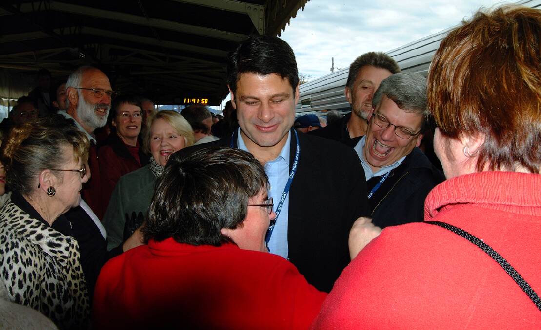 Victorian Premier Steve Bracks and Member for Ripon Joe Helper are greeted by thousands of people at the Ararat Train Station on July 10, 2004. Today marks 10 years since passenger rail returned to the region. More in tomorrow's Advertiser. 