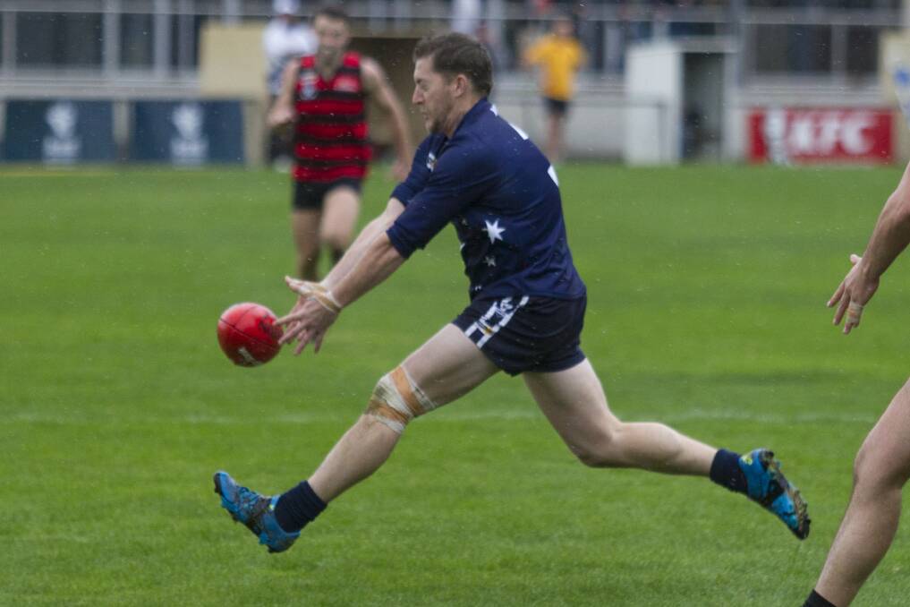 SPLIT: Ararat's Andrew Beckwith in full stride at Alexandra Oval when his side took on Penshurt in round six. Picture: PETER PICKERING