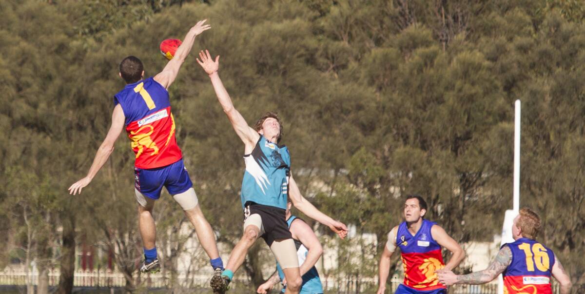 HIGH JUMP: Matthew Bourke and Josh Byron contest the ruck in the round 13 match between Great Western and Moyston-Willaura. Picture: PETER PICKERING