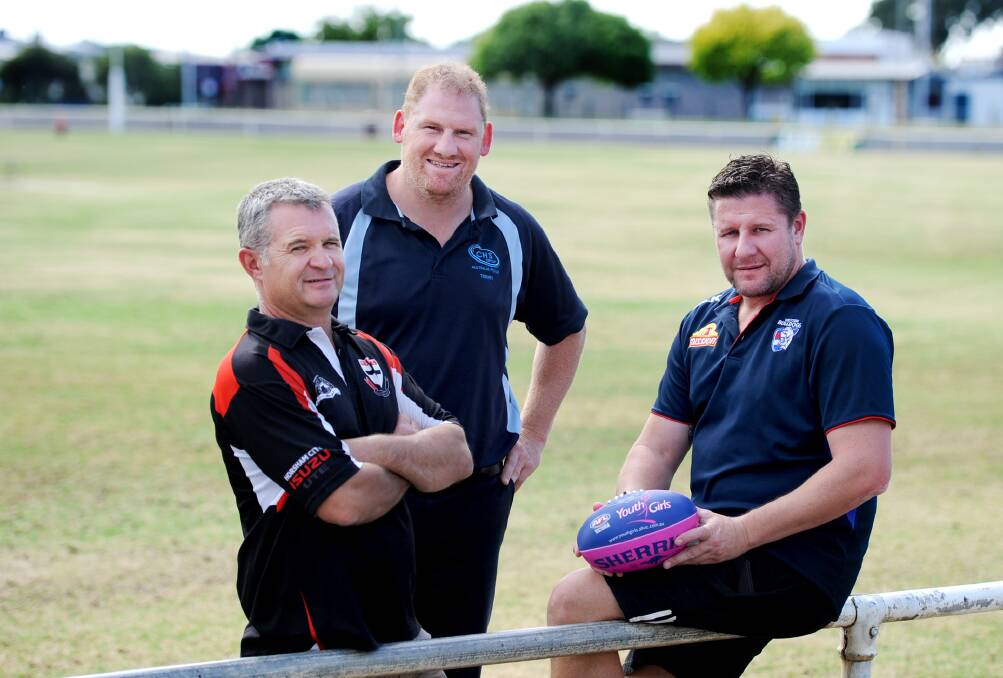 DRIVING FORCES: Mick Morris, Terry Arnel and Jason Muldoon will work hard to get the girls football off the ground. Picture: SAMANTHA CAMARRI