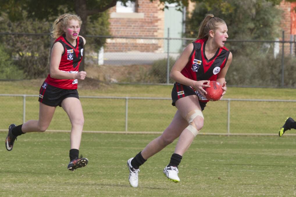 Hannah Blight carries the ball forward for Stawell. Picture: PETER PICKERING