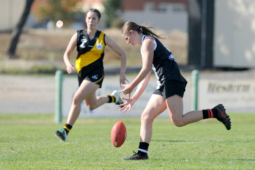 Coco Ledger chases down a ground ball against Portland in her sides round two win. Picture: OLIVIA PAGE