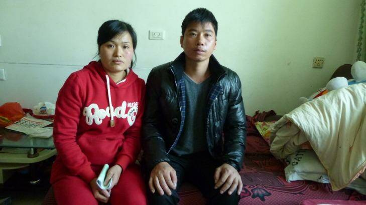 Painful memories: Yu Rongfen, with husband Xu Liangkai, had her foetus forcibly aborted..