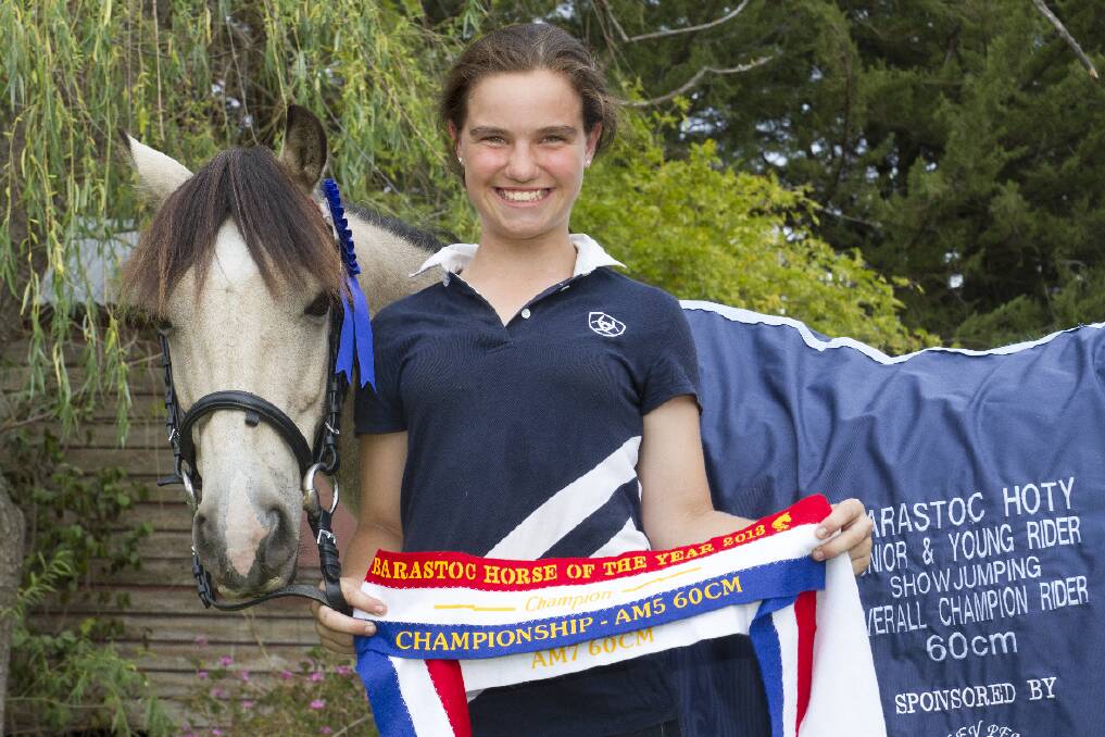Riley Perry-Parmenter with her show jump winning pony Freddy. Picture: PETER PICKERING