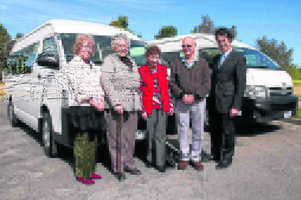 Ararat Retirement Village CEO, Robyn Woods-Gebler, Chinese Heritage Society representative Rene Reynolds, Ararat Senior Citizens Centre representatives Marlene Donaschenz and Alan Grant and East Grampians Health Service CEO Nick Bush with the new buses.