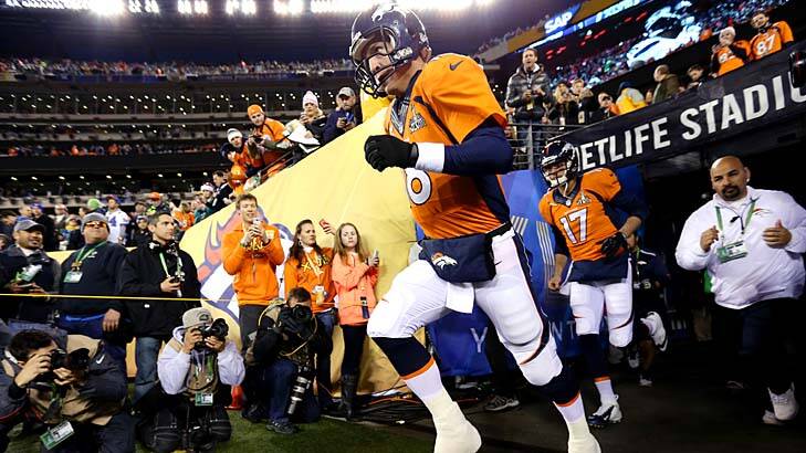 MVP: Peyton Manning runs out to warm up before the Super Bowl. Photo: Getty Images