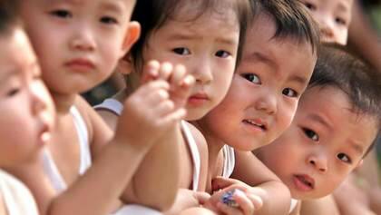 Chinese children gather at a park in Beijing.