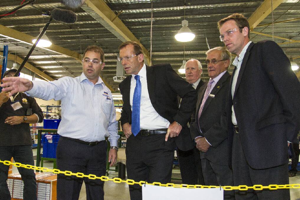 The then Opposition Leader Tony Abbott was in Ararat in May and took a tour of AME Systems. Manager Dean Pinniger is seen showing the now Prime Minister and Federal Member for Wannon Dan Tehan around the plant.