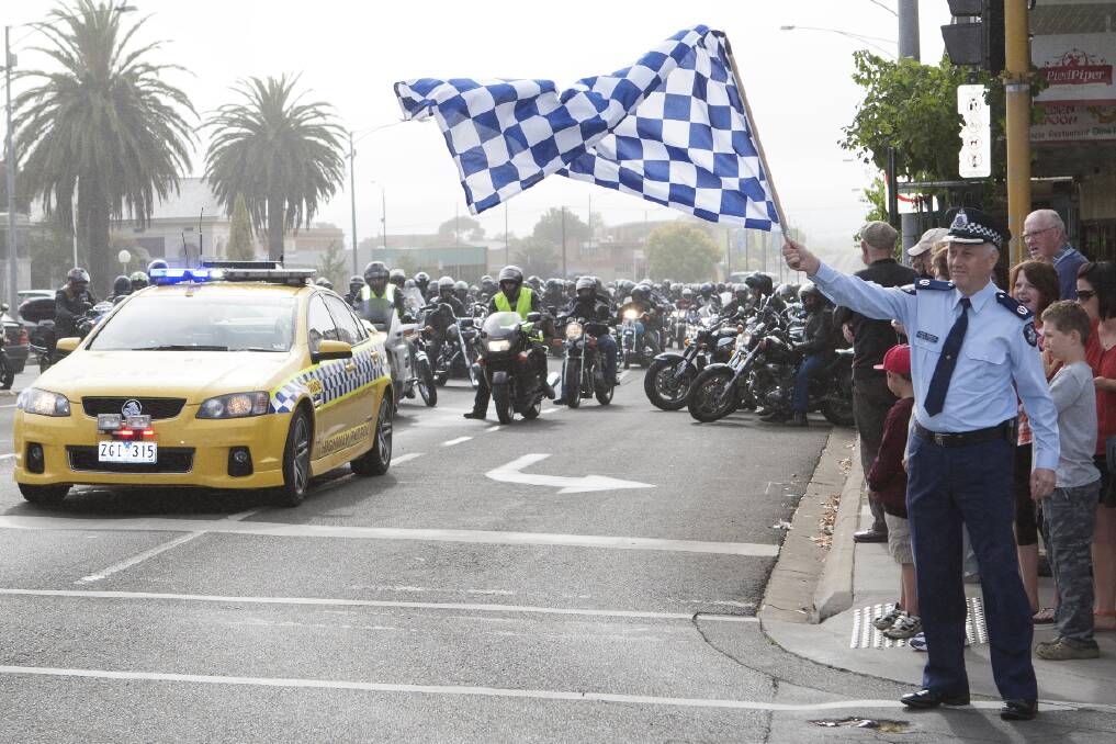 Assistant Commissioner Jack Blayney signals the start of the fifth annual Grampians Ride to Remember in February.