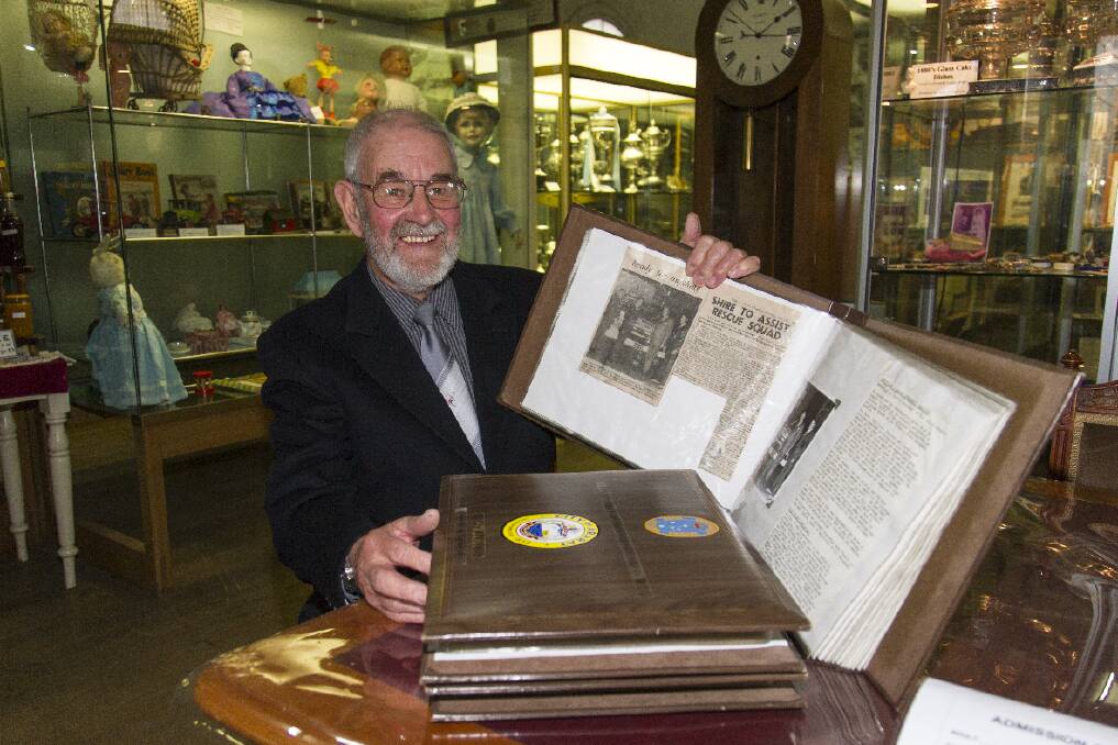 Former SES controller Brian Rickard with the array of memorabilia and documentation he donated to the Langi Morgala museum.