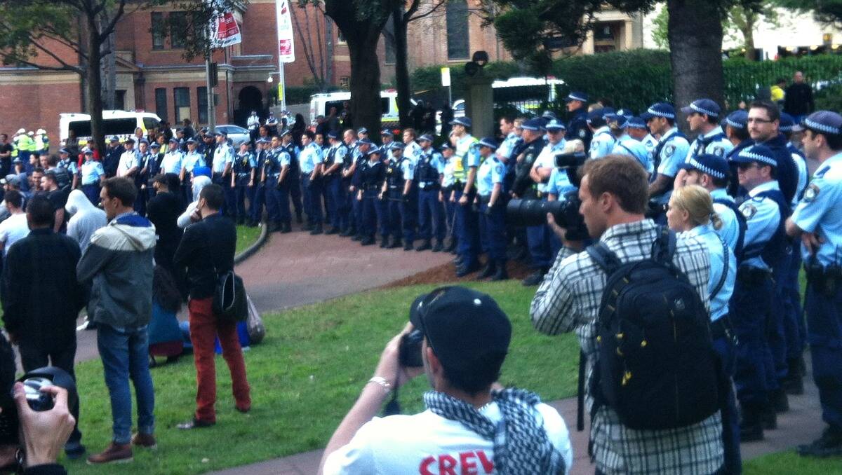  A ring of police encircles protestors at Hyde Park in central Sydney. Photo: Bevan Shields
