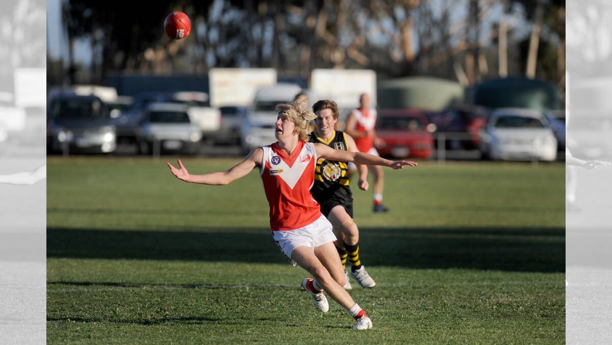 IN THE AIR: Taylors Lake's Max English goes for the mark. Picture: SAMANTHA CAMARRI