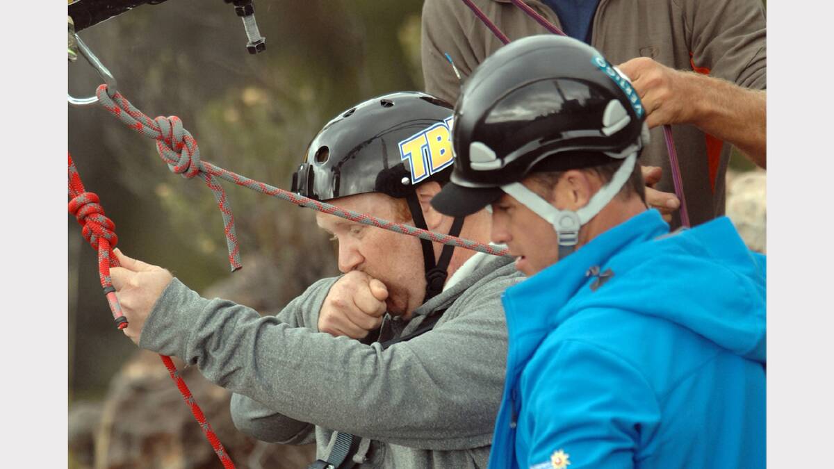 Contestant Matt ready for his turn on the custom built flying fox with trainer Shannan offering some encouragement. Picture: NETWORK TEN
