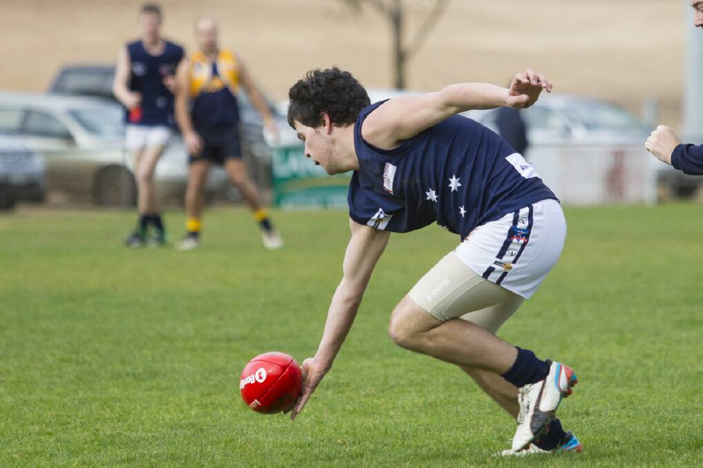 Oakley Taylor pounces on the ball for the Ararat Eagles.