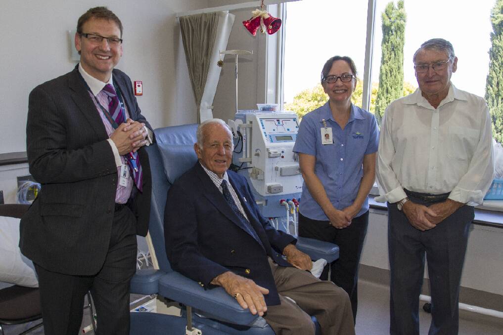 Professor Steve Holt and nurse Jane Smith with Max Howden (seated) and Terry Driscoll in the new unit.
