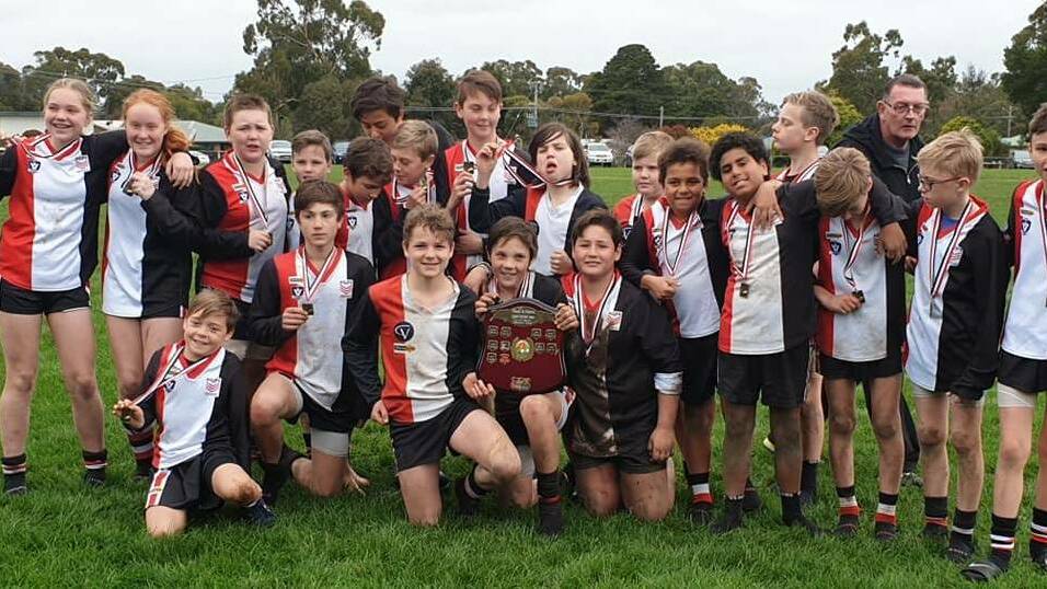 FOOTY FUN: The Warriors after winning Ararat & District Junior Football Association's Under 13 competition in 2019. Picture: FILE